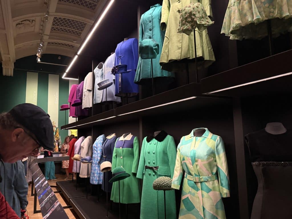 Some of the late Queen Elizabeth IIs clothes on display in September 2026 in the King's Gallery, London